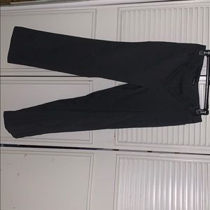 Dark grey pants suit.